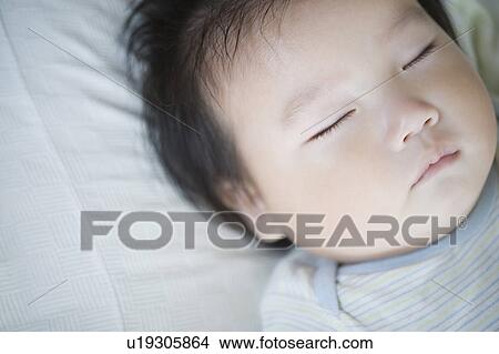 Picture - Sleeping baby. Fotosearch