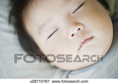 Stock Photo - Sleeping baby. Fotosearch