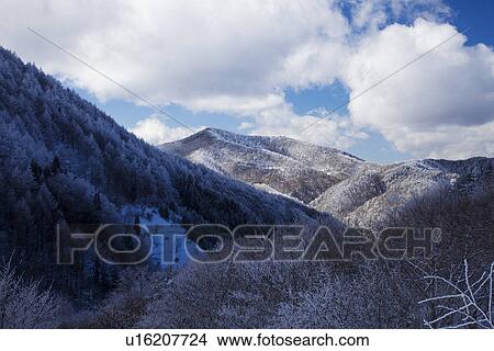 Snowcapped mountain peak View Large Photo Image Picture - Snowcapped mountain peak. Fotosearch