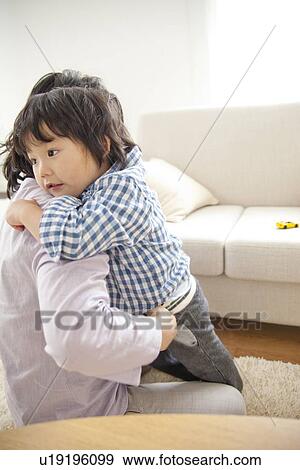 Son in mother's arms View Large Photo Image Stock Photo - Son in mother's arms. Fotosearch