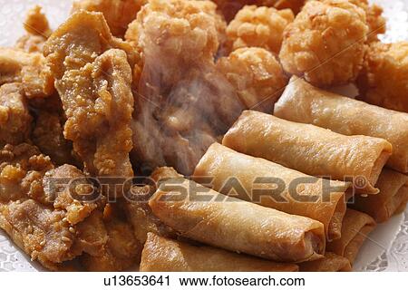 Spring roll and fried chicken View Large Photo Image Stock Image - Spring roll and fried chicken. Fotosearch