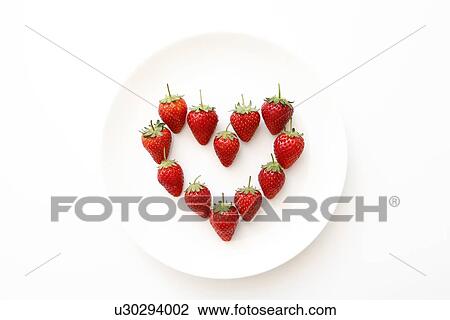 Strawberries creating a heart shape View Large Photo Image Stock Image - Strawberries creating a heart shape. Fotosearch