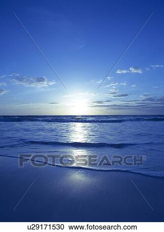 Stock Image - Sunrise at the beach, Florida, USA. Fotosearch