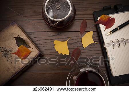 Stock Image - Tea and Diary In Autumn. Fotosearch
