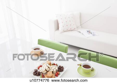 Tea Cups and Cakes View Large Photo Image Stock Photograph - Tea Cups and Cakes. Fotosearch
