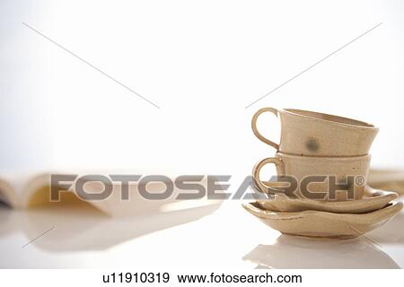 Teacups and Book View Large Photo Image Stock Photo - Teacups and Book. Fotosearch