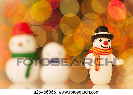 Three Decorative Snowmen and Christmas Lights View Large Photo Image Stock Photography - Three Decorative Snowmen and Christmas Lights. Fotosearch
