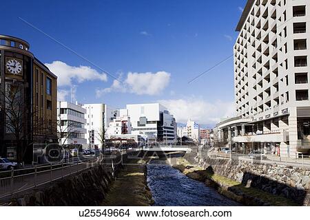 Picture - Toba river running through city. Fotosearch