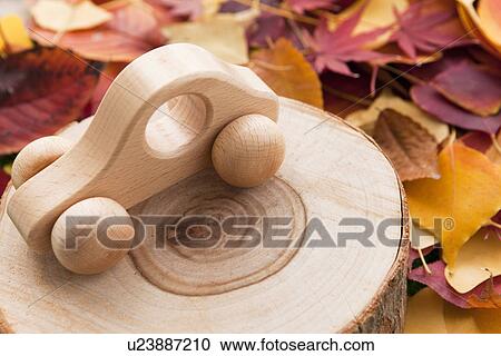 Toy Car on Tree Trunk View Large Photo Image Stock Image - Toy Car on Tree Trunk. Fotosearch