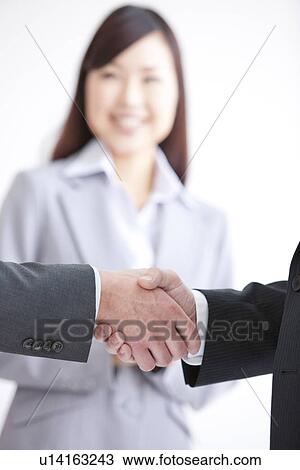 Two Businessmen Shaking Hands View Large Photo Image Stock Image - Two Businessmen Shaking Hands. Fotosearch
