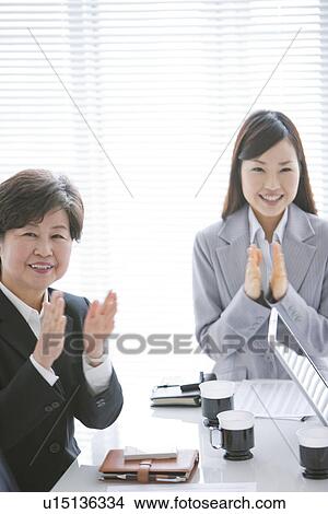 Two Businesswomen Clapping View Large Photo Image Picture - Two Businesswomen Clapping. Fotosearch