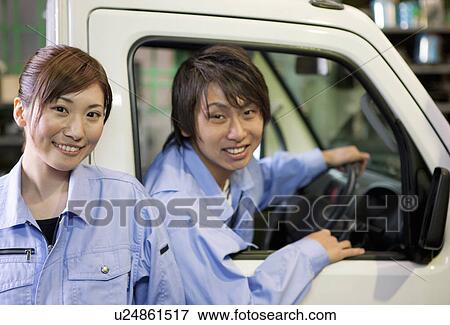 Two Car Mechanics View Large Photo Image Stock Photo - Two Car Mechanics. Fotosearch