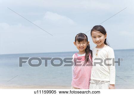 Two Girls Looking at Sea View Large Photo Image Stock Photography - Two Girls Looking at Sea. Fotosearch