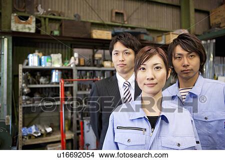Picture - Two Manual Workers and Businessman. Fotosearch