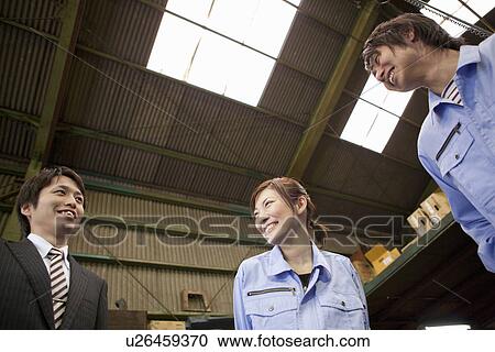 Two Manual Workers and Businessman Talking View Large Photo Image Stock Image - Two Manual Workers and Businessman Talking. Fotosearch
