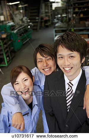 Two Manual Workers and Businessman View Large Photo Image Stock Photo - Two Manual Workers and Businessman. Fotosearch