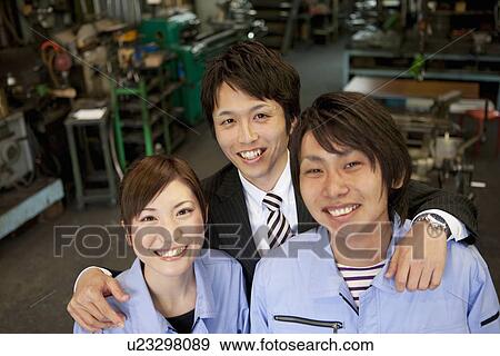 Stock Photo - Two Manual Workers and Businessman. Fotosearch