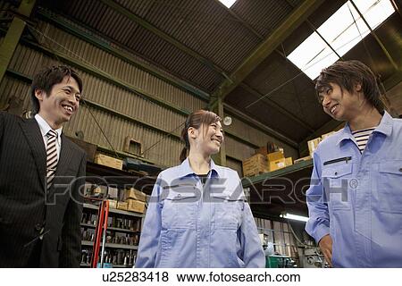Two Manual Workers and Businessman Talking View Large Photo Image Stock Photo - Two Manual Workers and Businessman Talking. Fotosearch