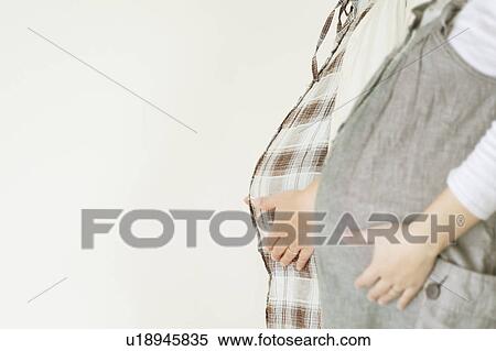 Two Pregnant Women Standing Side by Side View Large Photo Image Stock Photography - Two Pregnant Women Standing Side by Side. Fotosearch