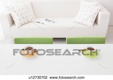 Two Tea Cups By Sofa View Large Photo Image Stock Image - Two Tea Cups By Sofa. Fotosearch
