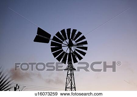 Stock Photo - Weather vane in silhouette. Fotosearch