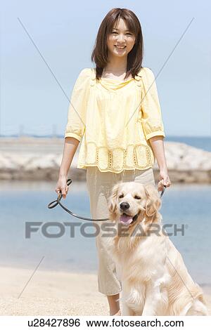 Woman and Dog on Beach View Large Photo Image Stock Photograph - Woman and Dog on Beach. Fotosearch