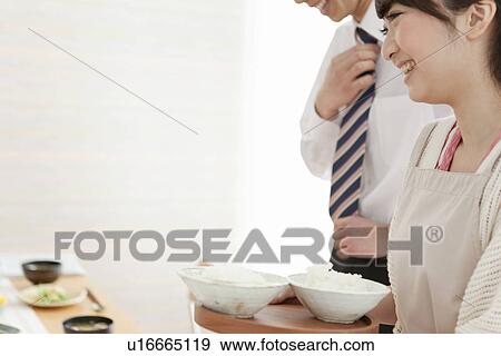 Young Couple By Breakfast Table View Large Photo Image Stock Photo - Young Couple By Breakfast Table. Fotosearch