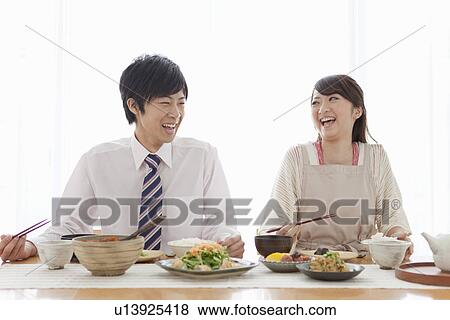Young Couple Having Breakfast View Large Photo Image Stock Photo - Young Couple Having Breakfast. Fotosearch