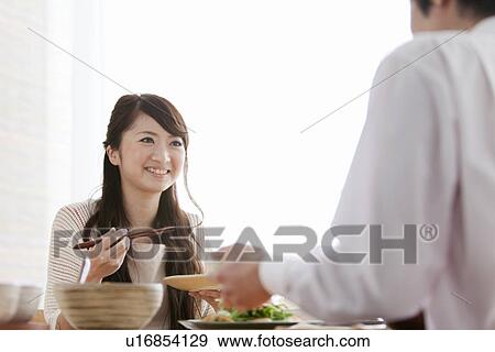 Young Couple Having Breakfast View Large Photo Image Stock Photo - Young Couple Having Breakfast. Fotosearch