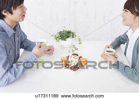 Young Couple Having Snack View Large Photo Image Stock Photo - Young Couple Having Snack. Fotosearch