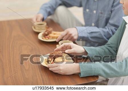 Young Couple Having Snack View Large Photo Image Stock Photography - Young Couple Having Snack. Fotosearch