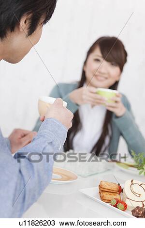 Young Couple Having Tea and Playing Chess View Large Photo Image Stock Image - Young Couple Having Tea and Playing Chess. Fotosearch