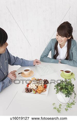 Young Couple Having Tea and Playing Chess View Large Photo Image Stock Photo - Young Couple Having Tea and Playing Chess. Fotosearch