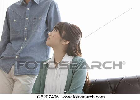 Young Couple on Sofa View Large Photo Image Stock Photograph - Young Couple on Sofa. Fotosearch