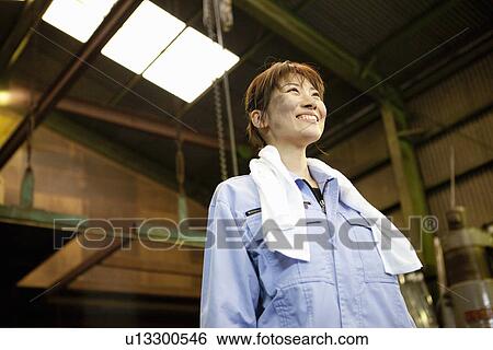 Young Female Factory Worker View Large Photo Image Stock Photograph - Young Female Factory Worker. Fotosearch