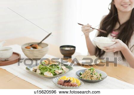 Young Woman Eating Breakfast View Large Photo Image Stock Photograph - Young Woman Eating Breakfast. Fotosearch