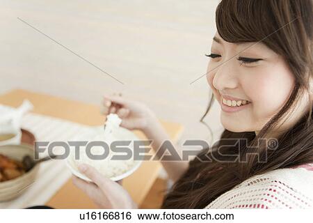 Young Woman Eating Breakfast View Large Photo Image Stock Photograph - Young Woman Eating Breakfast. Fotosearch
