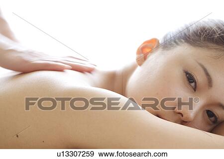 Young Woman Receiving Massage, Head and Shoulders View Large Photo Image Stock Photo - Young Woman Receiving Massage, Head and Shoulders. Fotosearch