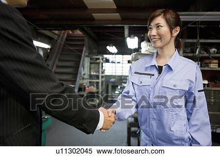 Young Woman Shaking Boss'S Hand View Large Photo Image Stock Photography - Young Woman Shaking Boss'S Hand. Fotosearch