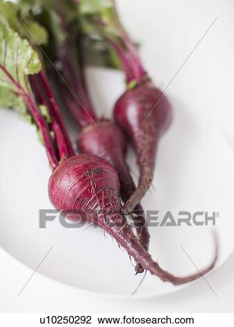 Stock Image - Beetroots on plate, studio shot. Fotosearch