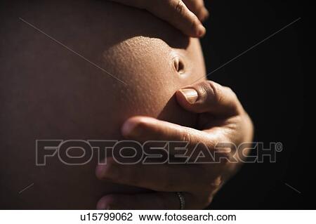 Belly of pregnant woman View Large Photo Image Stock Image - Belly of pregnant woman. Fotosearch