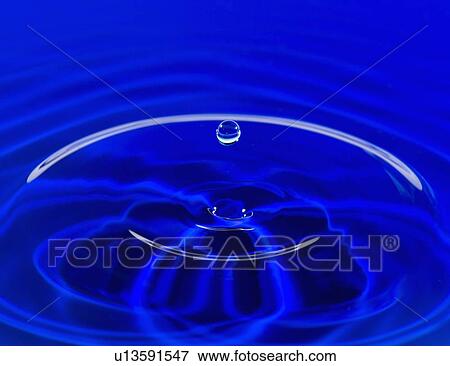 Blue water splashing View Large Photo Image Stock Photo - Blue water splashing. Fotosearch