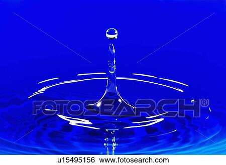 Stock Photograph - Blue water splashing. Fotosearch