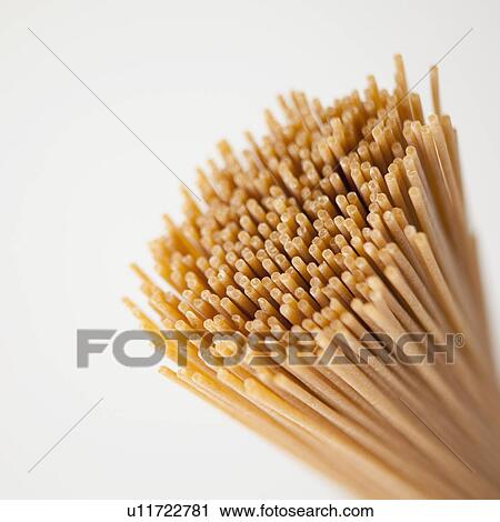 Bunch of dried spaghetti, close-up View Large Photo Image Stock Image - Bunch of dried spaghetti, close-up. Fotosearch