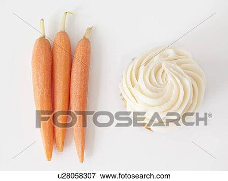 Carrots and muffin on white background, studio shot View Large Photo Image Stock Photo - Carrots and muffin on white background, studio shot. Fotosearch