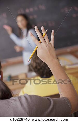 Stock Image - Children (10-11, 12-13) at school. Fotosearch