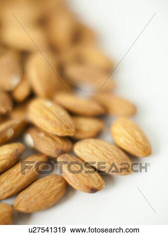 Close-up of almonds on plate, studio shot View Large Photo Image Stock Photo - Close-up of almonds on plate, studio shot. Fotosearch