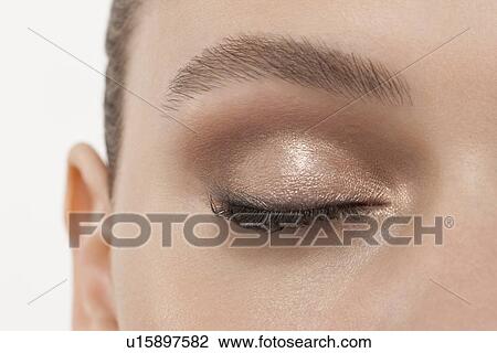 Stock Image - Close-up of female eye with make-up. Fotosearch
