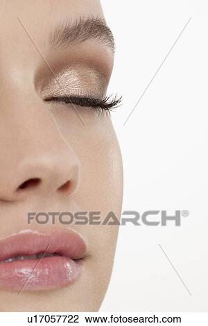 Stock Image - Close-up of female face with make-up. Fotosearch