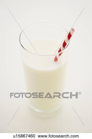 Close up of glass of milk with straw View Large Photo Image Stock Image - Close up of glass of milk with straw. Fotosearch
